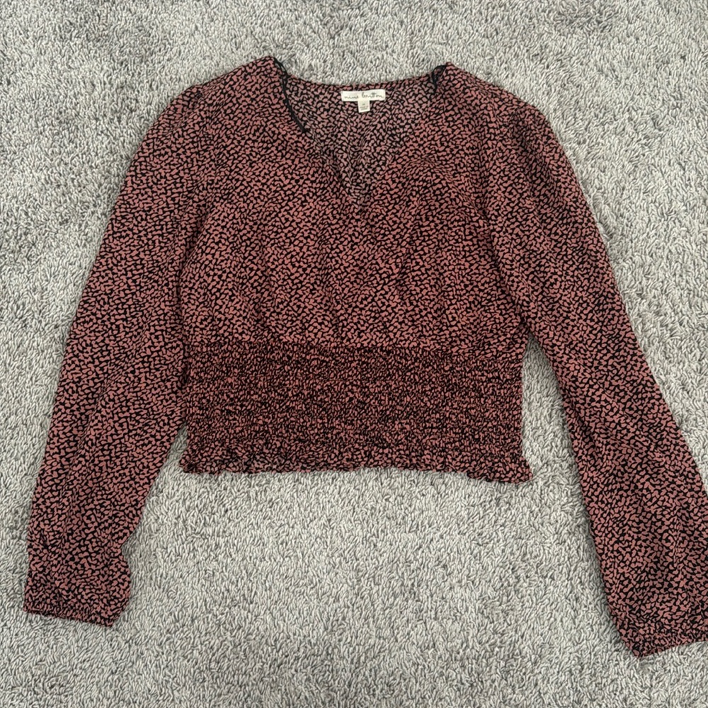 Cropped, long sleeve blouse with smocked detail